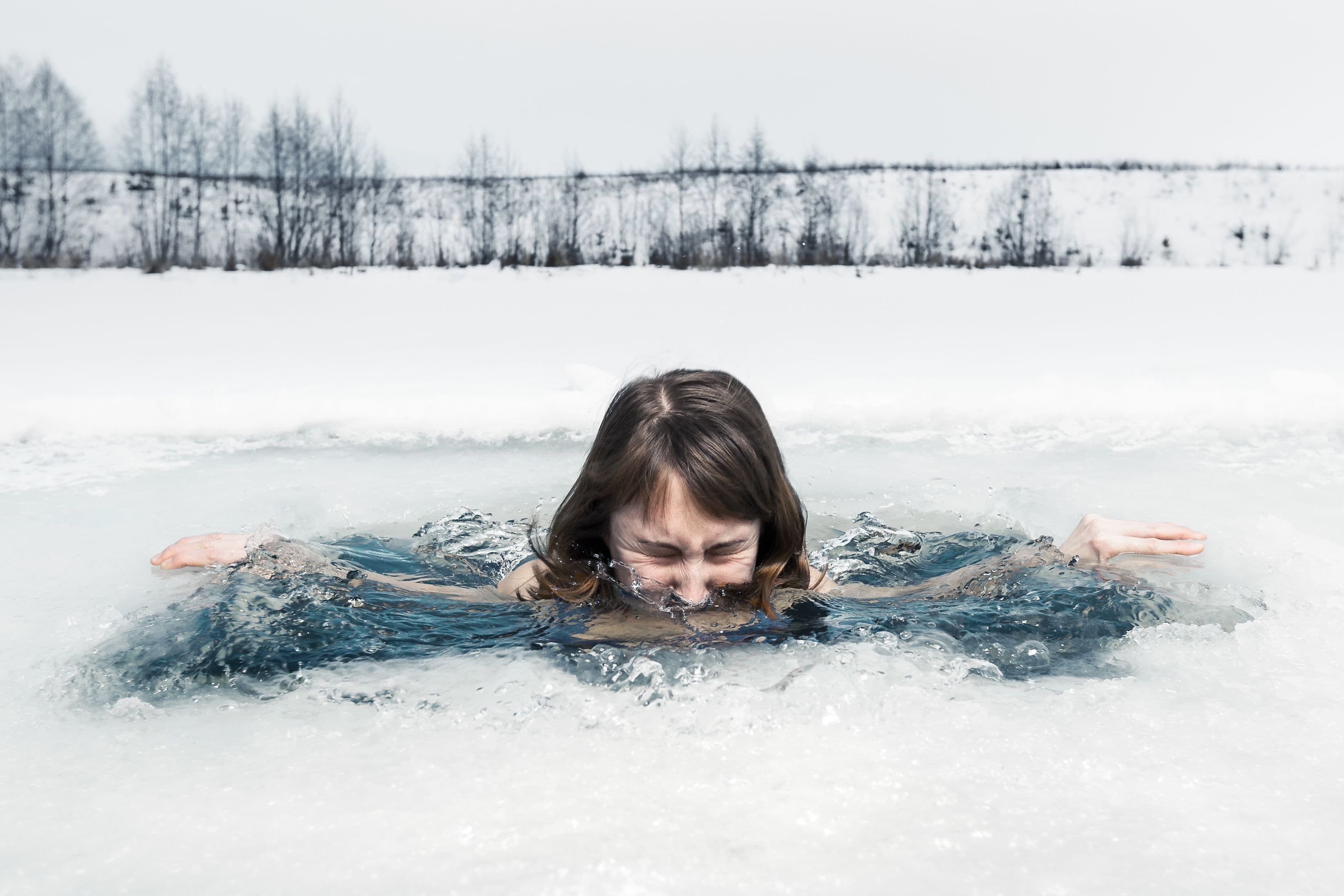 Woman cooling down in an ice bath