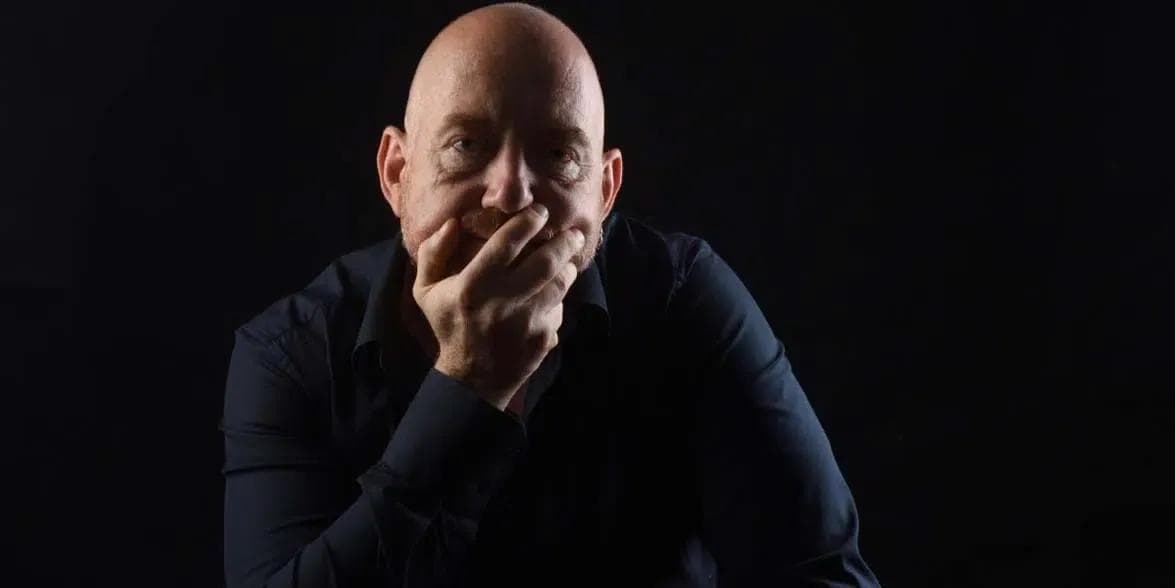 Middle-aged man looking thoughtful