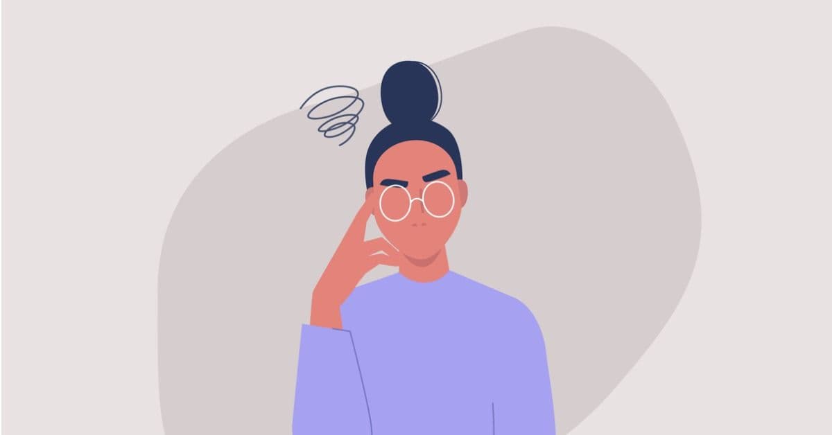 Silmälasipäinen nainen, jolla ketuttaa ja ärsyttää